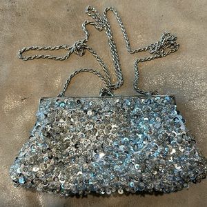 La Regale silver sequin evening bag